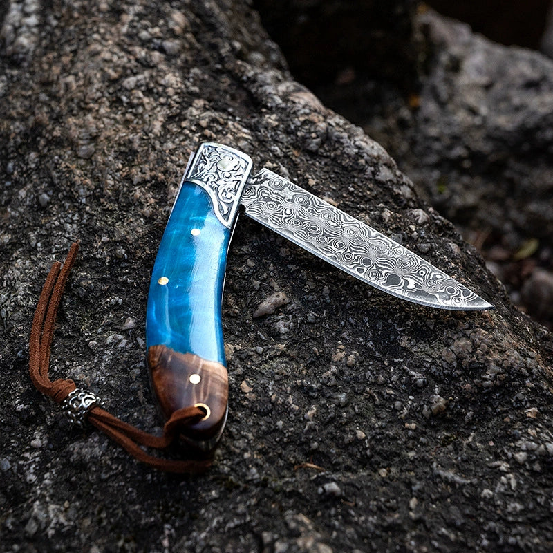 Camping folding knife handle and blade detail