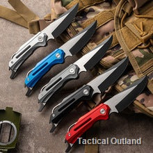 D2 steel folding knives arranged on tactical outdoor gear
