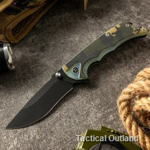 Close-up of a VG10 Damascus folding knife with a curved camouflage handle