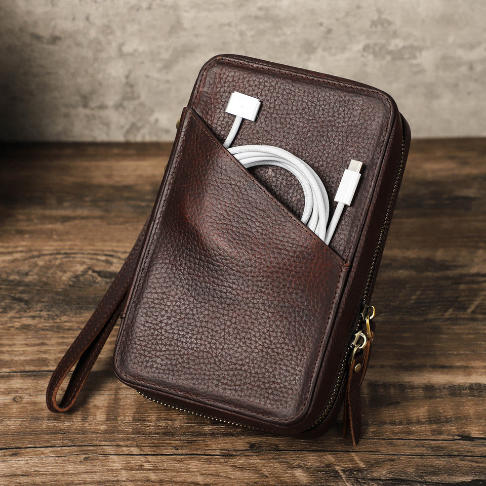 Brown leather travel tech organizer with exterior quick-access pocket