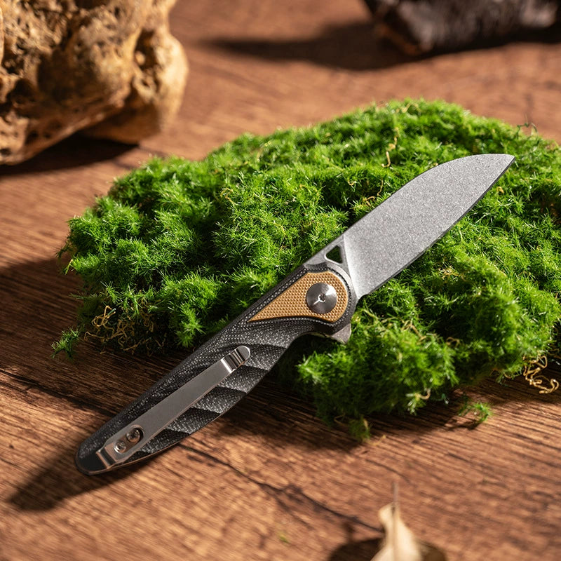 G10 liner-lock handle detail on a D2 folding knife