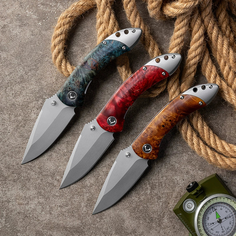 VG10 blade profile on a titanium-alloy folding knife