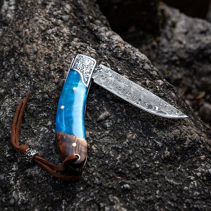 Camping folding knife handle and blade detail
