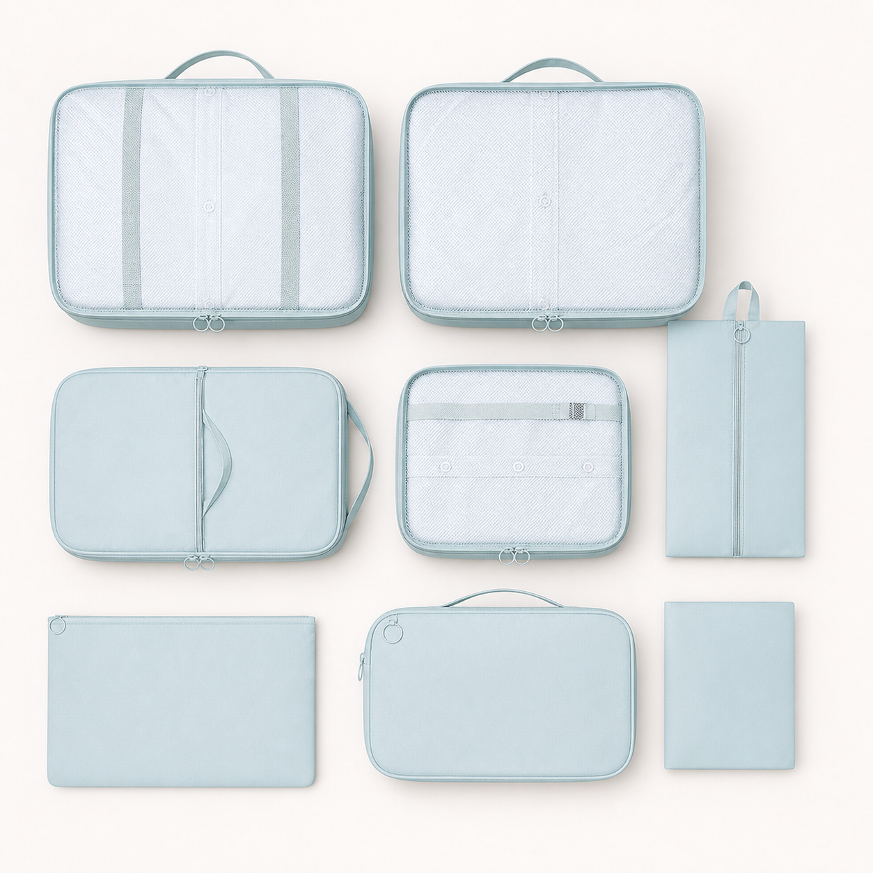 All eight light blue packing organizers shown together on a clean background