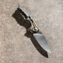 VG10 Damascus unsharpened folding knife blade detail on stone