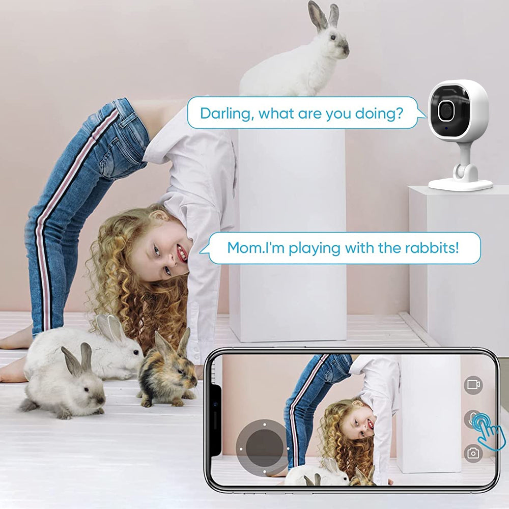 A mother using the camera app to talk to her young daughter playing in the nursery.