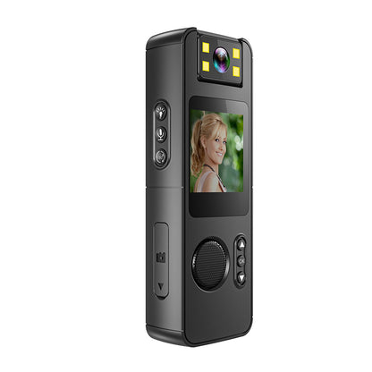 Compact professional video recorder with integrated shirt clip for hands-free use.