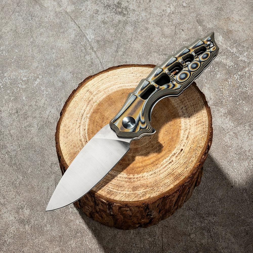 VG10 Damascus unsharpened folding knife blade detail on stone