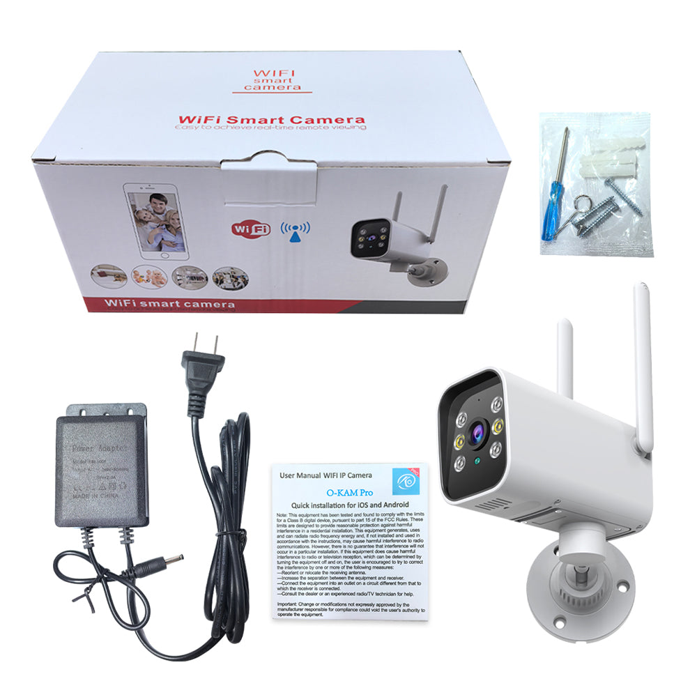 Tactical Outland 1080p smart outdoor security camera kit, showing the product box, mounting screws, power adapter, and user manual unboxed on a white background.