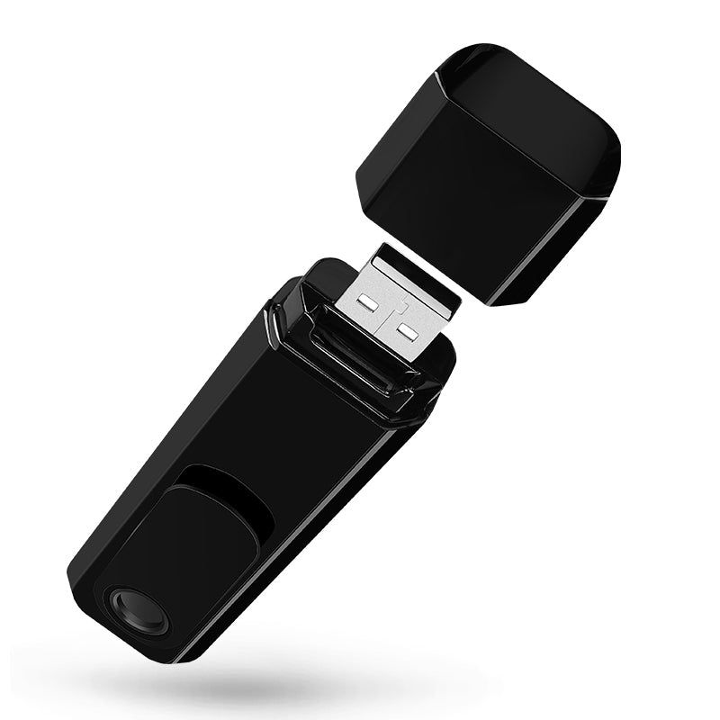 Tactical Outland Pro body camera with the cap removed, revealing the built-in USB port for easy charging and data transfer.