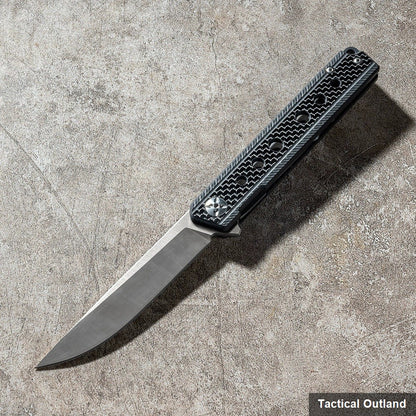 Carbon fiber D2 steel folding knife lifestyle view for outdoor utility