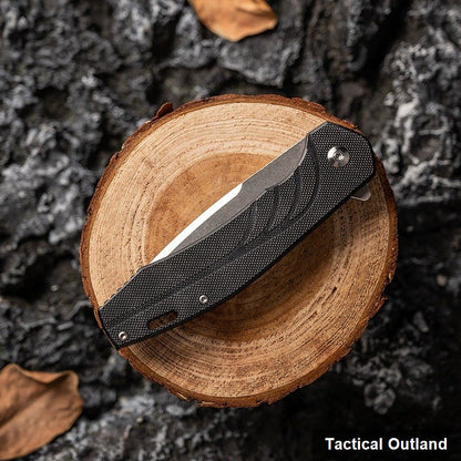 D2 steel G10 folding knife handle and liner-lock detail
