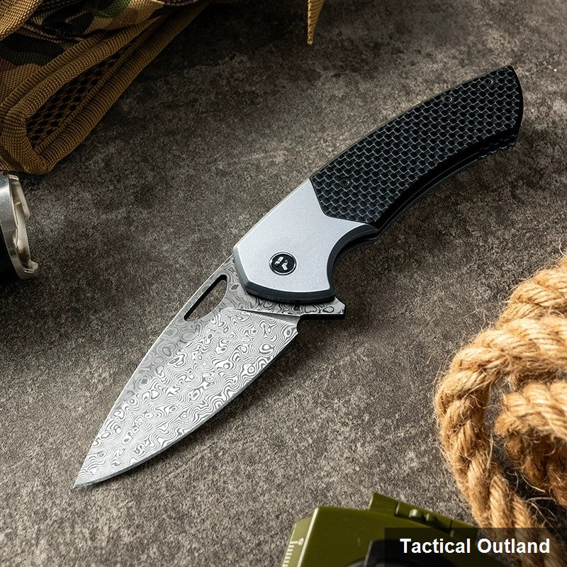 VG10 titanium carbon-fiber frame-lock folding knife shown open